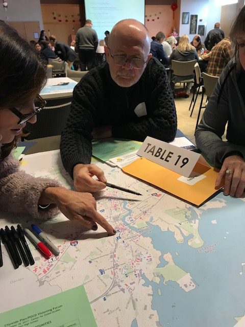 People looking at map during the Norwalk Citywide Plan Vision Forum